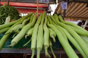 Mercato Ballaro, food shopping, vegetables, street vendor, zucchini, Italian living, eating right, Long zucchinis